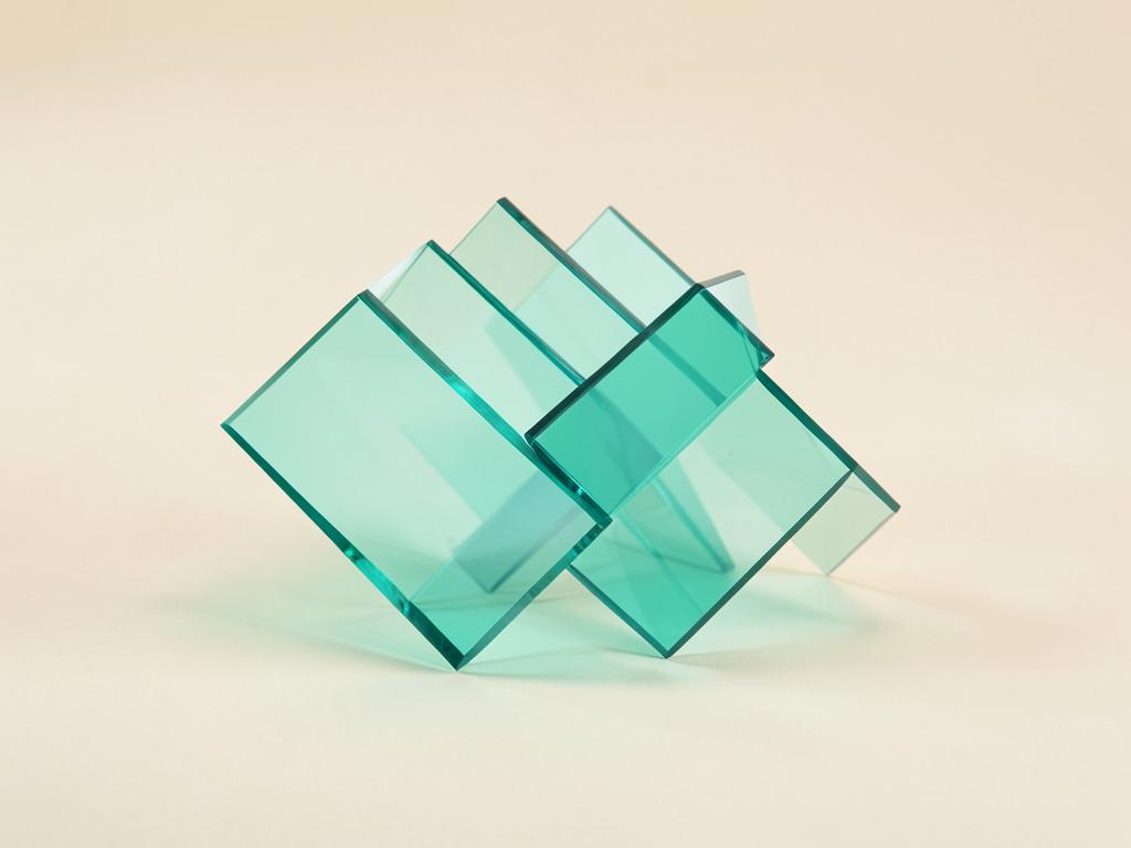 Ineinandergreifende Glasflächen als Sinnbild für Kompatibilität